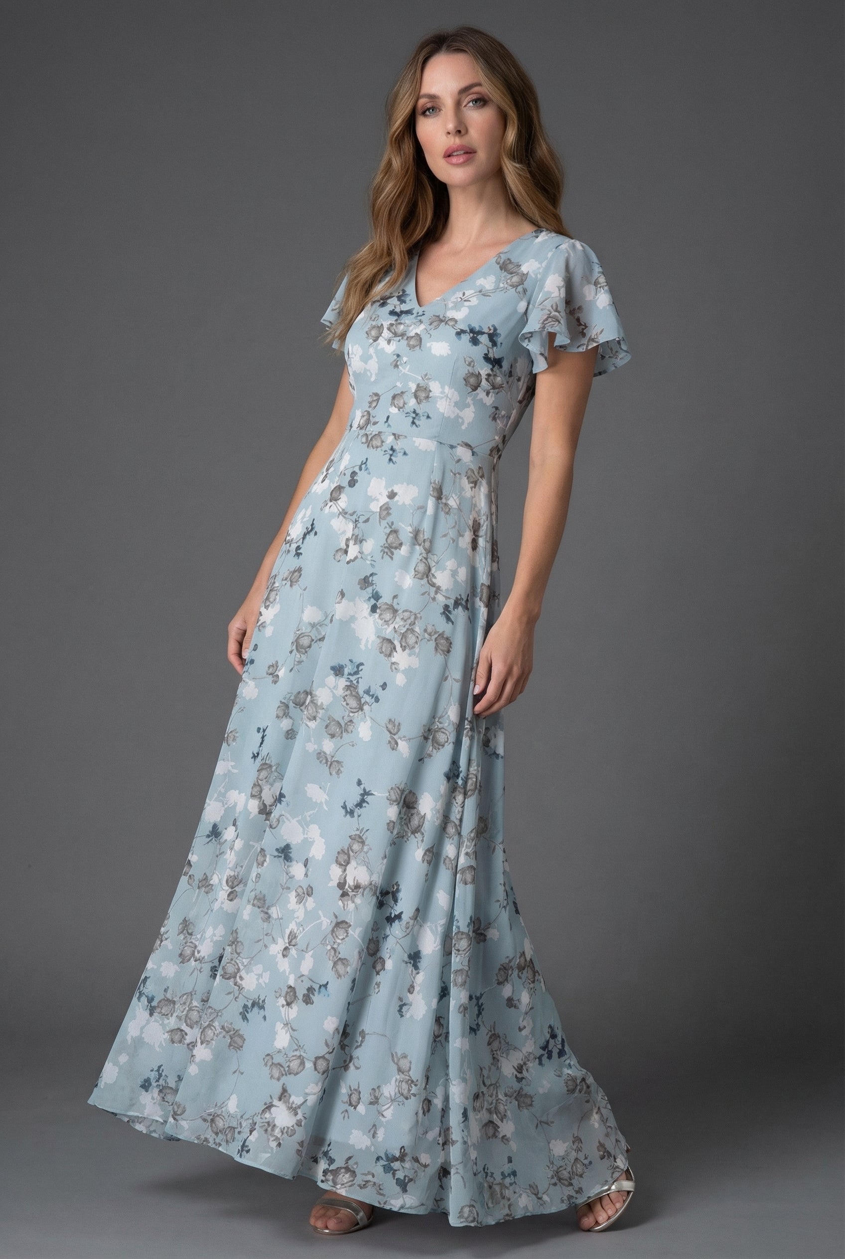 Flutter Sleeve Floral Maxi Dress with V-Neckline and Flowing Chiffon Style Skirt