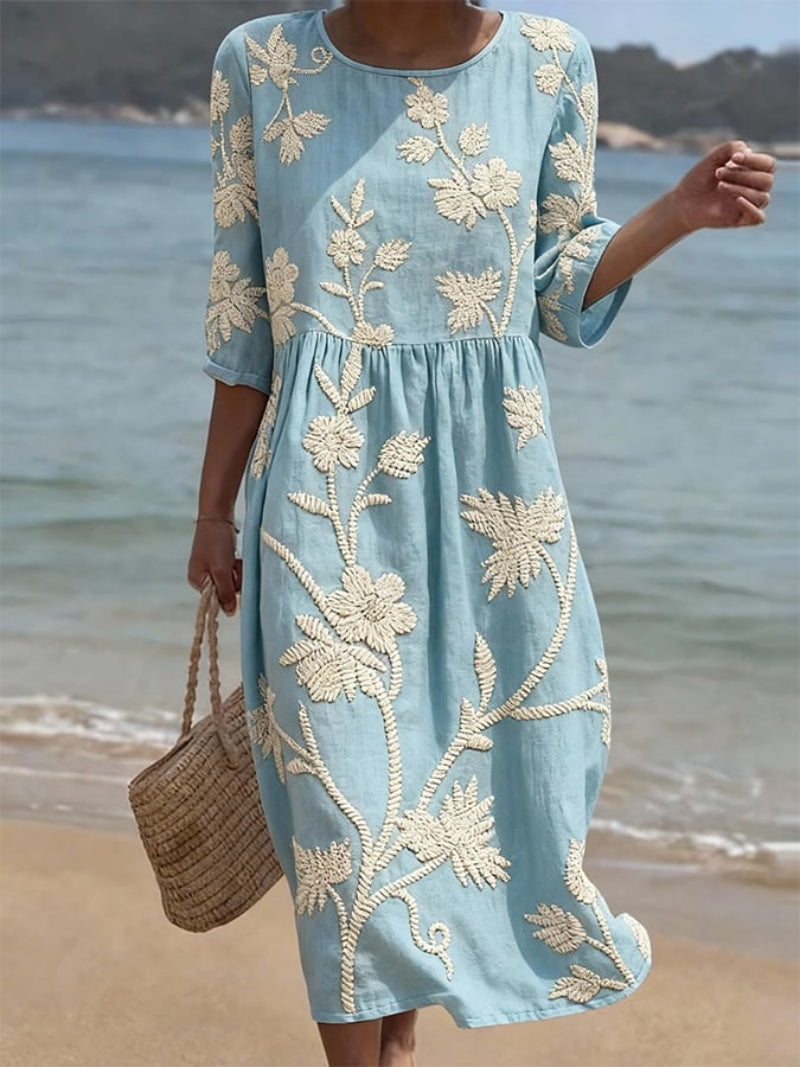 Women's midi dress with an embroidered floral design