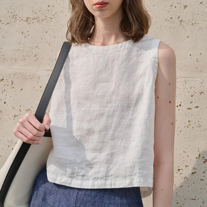 Asymmetric linen crop top for women featuring sleeveless crew neck