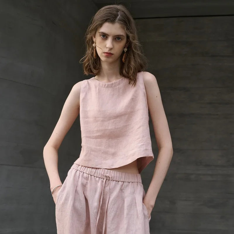 Asymmetric linen crop top for women featuring sleeveless crew neck