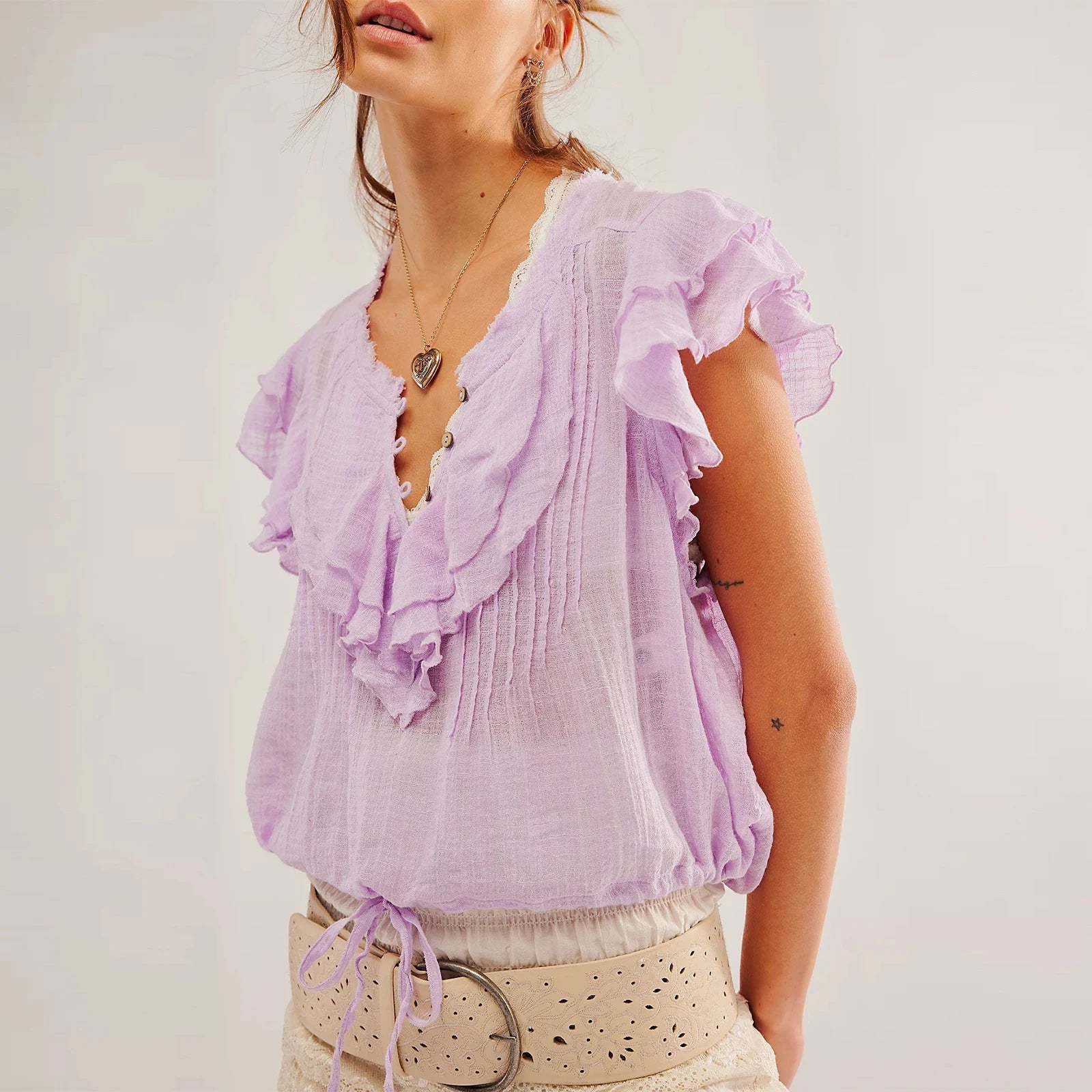 Women's crop top in cotton gauze with ruffle front — beach