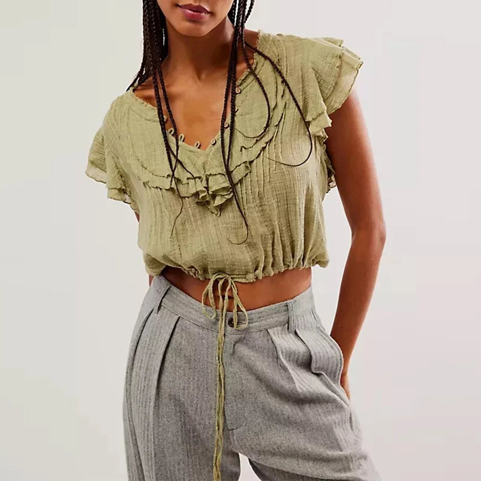 Women's crop top in cotton gauze with ruffle front — beach