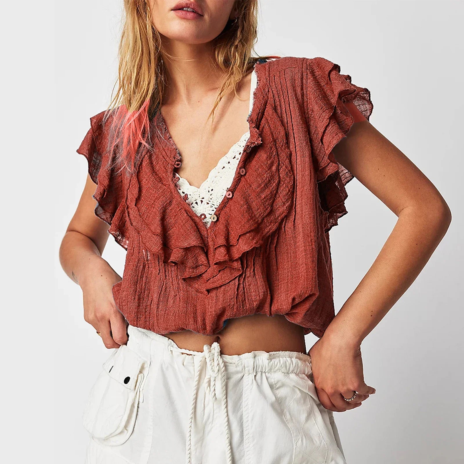 Women's crop top in cotton gauze with ruffle front — beach